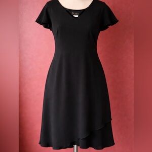 Black Dress SL Fashions
Size 16
